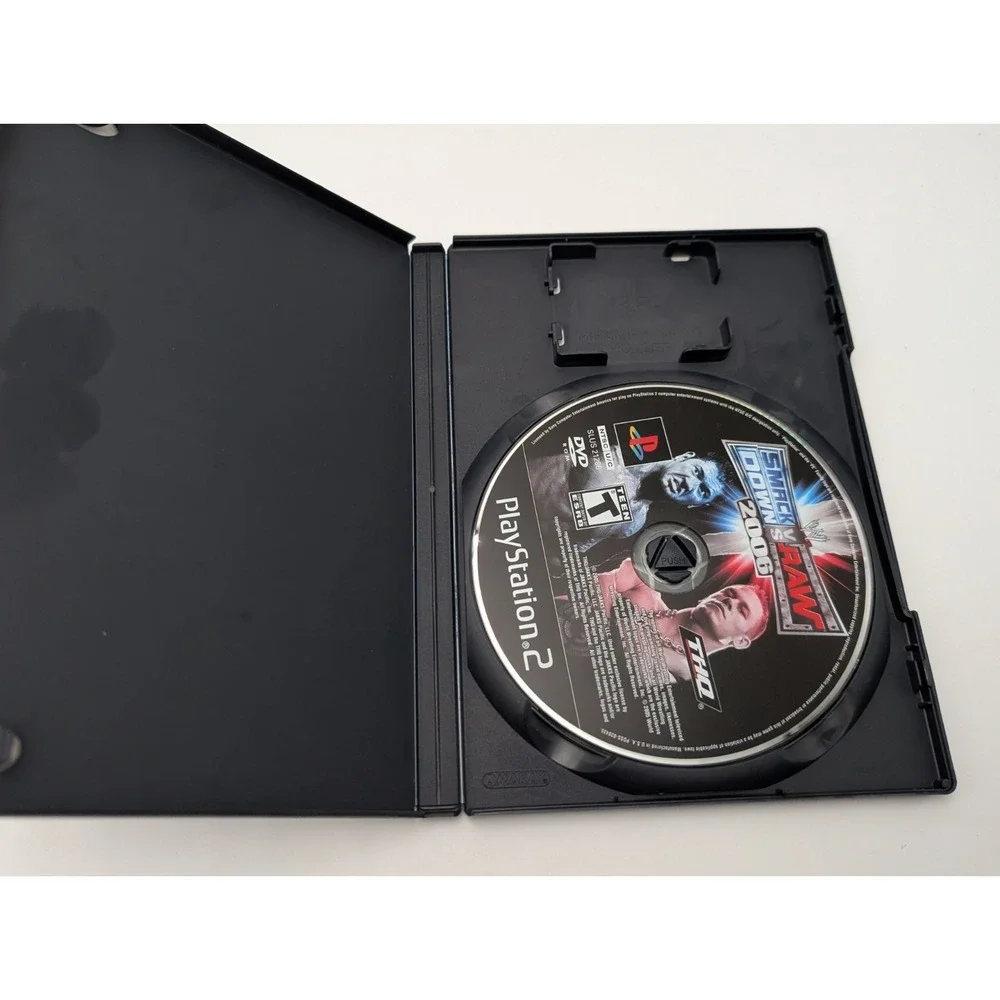 WWE SmackDown vs. Raw 2006 (Sony PlayStation 2, 2005) Ps2 Near Mint Disc